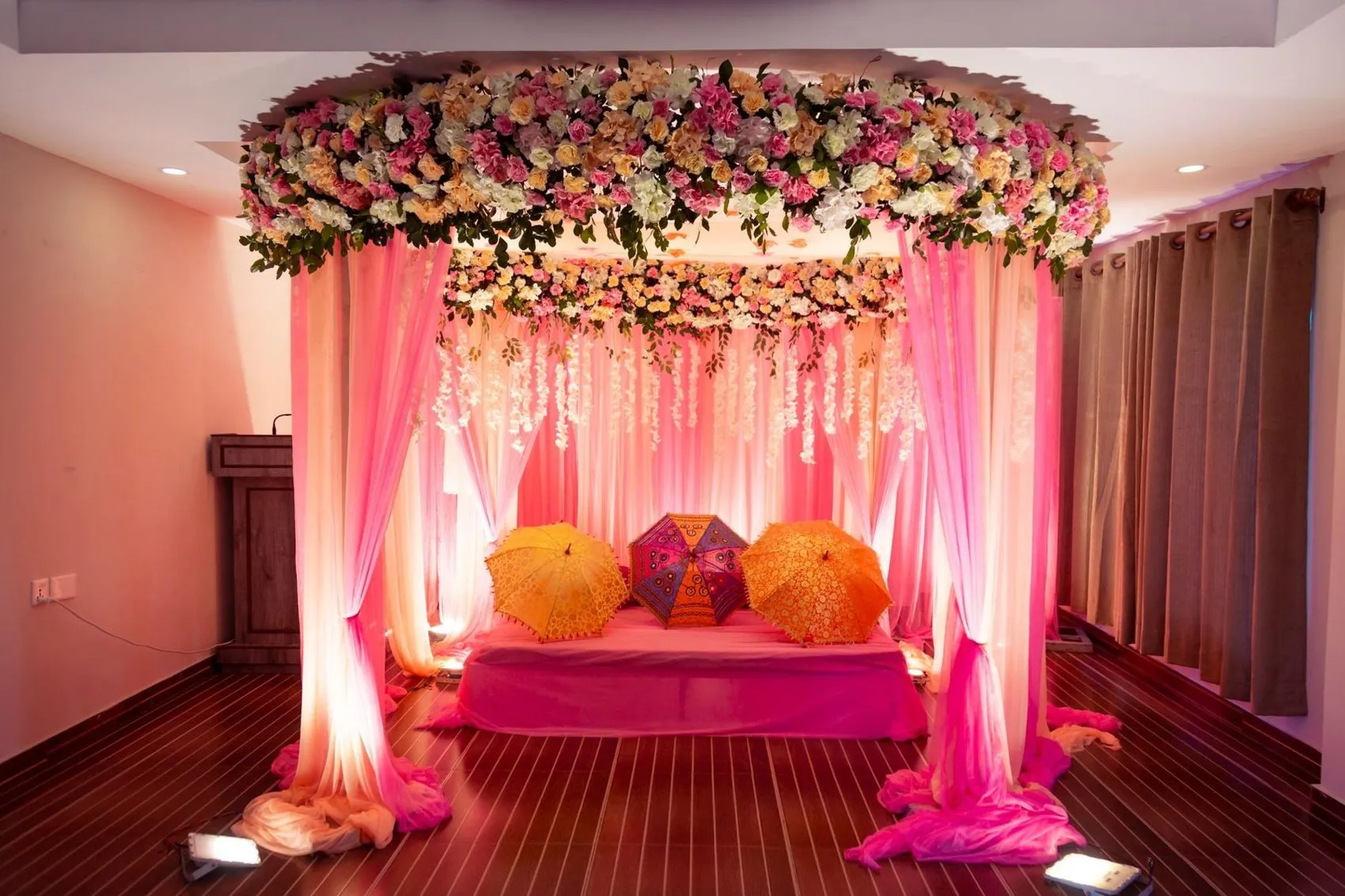 Wedding stage with pink drapes